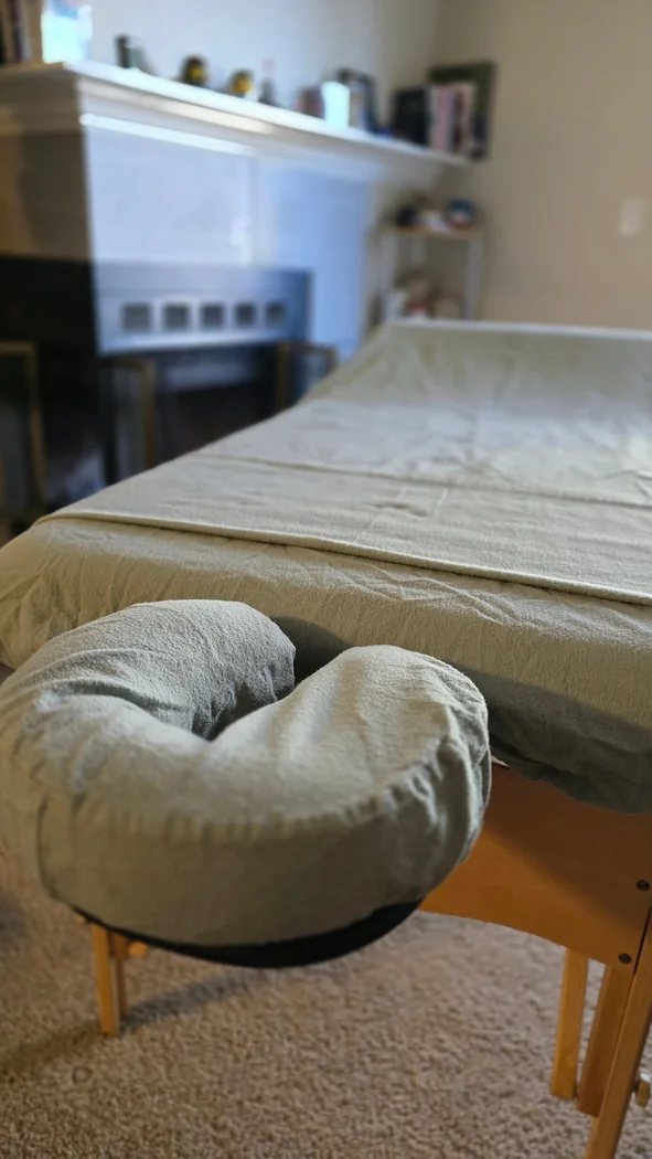 Mobile massage setup, heated table with premium linens